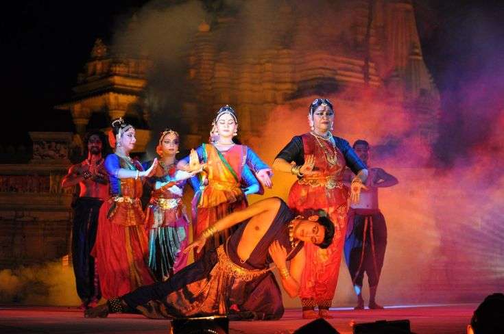 Khajuraho Dance Festival 2025: A Celebration of Culture, Art, and History The Khajuraho Dance Festival 2025 promises to be an unforgettable journey into the heart of Indian classical dance. Nestled amidst the architectural grandeur of Khajuraho, this festival is one of the most celebrated cultural events in India. Known for its awe-inspiring temples, intricate sculptures, and vibrant cultural heritage, Khajuraho transforms into a dazzling stage where artists from across the country and beyond gather to showcase their talent. If you’re looking to experience a fusion of history, culture, and traditional dance forms, the Khajuraho Dance Festival is a must-attend event. Let’s dive into the details of this festival, its significance, and why you shouldn’t miss it in 2025. What is the Khajuraho Dance Festival? The Khajuraho Dance Festival is an annual event that celebrates Indian classical dance forms in the picturesque setting of Khajuraho, a UNESCO World Heritage Site in Madhya Pradesh. Held every year in the month of February or March, the festival is a week-long celebration that brings together some of the finest classical dancers and performers from across India and beyond. The performances take place against the backdrop of the stunning temples, which are renowned for their elaborate stone carvings depicting various deities, dancers, and celestial beings. The festival is a tribute to the rich cultural history of Khajuraho, which dates back to the Chandela dynasty (10th to 12th century). The temples here are famous for their unique architectural style and are adorned with intricate sculptures that depict scenes of divine and earthly life, including many dancing figures. This vibrant setting makes the Khajuraho Dance Festival not just a celebration of dance but also an immersive experience into the region’s cultural and architectural heritage. When is the Khajuraho Dance Festival 2025? The Khajuraho Dance Festival 2025 will be held from February 20th to February 26th, 2025. The festival takes place every year in the first week of March or the last week of February, so 2025 is no exception. As you plan your trip, keep in mind that the dates coincide with the pleasant winter season in Khajuraho, which means you can expect cool, comfortable weather – perfect for soaking in the cultural extravaganza. Why is the Khajuraho Dance Festival Important? Khajuraho’s rich cultural heritage and its spectacular temples make the city one of India’s most historically significant places. The Dance Festival plays a vital role in preserving and promoting classical Indian dance forms that are an integral part of India’s art and culture. The festival also serves as a platform for both established and emerging dancers to showcase their skills and keep these ancient art forms alive for generations to come. For visitors, the festival offers a chance to experience the ancient temples up close, while enjoying the beauty of classical dance performances. It's a fusion of art, architecture, and spirituality that provides an enriching experience. The festival highlights India’s rich cultural diversity, with performances that span different classical dance traditions, from Bharatanatyam to Odissi, Kathak, Kuchipudi, and more. Highlights of the Khajuraho Dance Festival 2025 Classical Dance Performances One of the biggest draws of the Khajuraho Dance Festival is, of course, the mesmerizing classical dance performances. The festival showcases several different forms of classical dance, each with its own unique rhythm, movements, and storytelling tradition. These include: Bharatanatyam: Known for its graceful movements, intricate footwork, and expressive storytelling, Bharatanatyam is one of the oldest and most revered dance forms in India. Kathak: This dance form, originating from North India, features intricate footwork, spins, and dramatic storytelling through facial expressions and body movements. Kuchipudi: Known for its fluidity and grace, Kuchipudi blends drama, dance, and music, and is famous for its portrayal of mythological themes. Odissi: One of the oldest surviving dance forms, Odissi is characterized by its graceful, curving movements and intricate footwork, often accompanied by devotional music. Stunning Temple Backdrop The Khajuraho temples, built between 950 and 1050 CE, serve as a breathtaking backdrop for the dance performances. The temples are known for their striking sculptures, including those of gods, animals, dancers, and lovers, which provide an inspiring setting for the festival. The golden light of the setting sun casts a magical glow on the temples as the dancers perform, adding a spiritual and ethereal element to the experience. Dazzling Lighting and Ambiance The festival also features spectacular lighting that illuminates the temples at night, creating a mesmerizing atmosphere. The soft glow of the lights enhances the beauty of the intricate temple carvings while providing an enchanting setting for the dancers to perform. The combination of music, dance, and the illuminated temples creates an atmosphere that is both magical and immersive. Workshops and Interactions In addition to the performances, the Khajuraho Dance Festival also hosts workshops and interactive sessions where festival-goers can engage with the dancers and learn more about the intricacies of classical dance forms. These sessions offer a chance for enthusiasts and aspiring dancers to deepen their understanding of the art, as well as to get inspired by some of the best in the industry. Cultural Extravaganza for All Ages Whether you’re a dance enthusiast, a culture lover, or someone who enjoys exploring new places, the Khajuraho Dance Festival offers something for everyone. The festival’s performances and workshops cater to a wide range of audiences, from children to adults. The event is designed to celebrate the richness of Indian classical dance in a way that can be enjoyed by all, regardless of age or background. Where to Stay During the Khajuraho Dance Festival As Khajuraho is a popular tourist destination, there are a variety of accommodation options available for visitors. From luxury hotels to budget guesthouses, here are a few places to stay during the festival: The Lalit Temple View Khajuraho: A luxury hotel offering a stunning view of the temples, providing a blend of modern amenities and traditional Indian hospitality. Radisson Hotel Khajuraho: A well-known hotel with comfortable rooms, a swimming pool, and excellent dining options. Khajuraho Huts: A budget-friendly option, offering a more rustic and peaceful experience. Hotel Chandela: A mid-range hotel located close to the festival venues, offering good facilities and a comfortable stay. Where to Eat in Khajuraho Khajuraho offers a wide range of dining options that cater to both traditional Indian tastes and international flavors. During the festival, local food stalls and eateries spring up around the temple grounds, offering delicious snacks and meals. Here are a few places to try: Raja’s Café: A popular spot for tourists, offering Indian and continental dishes with a view of the temples. The Maharaja Restaurant: A local favorite for traditional Indian food and snacks. Cafe de la Paix: Known for its laid-back ambiance and a variety of international dishes. Final Thoughts The Khajuraho Dance Festival 2025 promises to be a spectacular celebration of India’s rich cultural and artistic heritage. Whether you’re a lover of classical dance, history, or just in search of a unique cultural experience, this festival offers a chance to witness the fusion of music, dance, and spirituality like never before. With stunning performances against the backdrop of Khajuraho’s ancient temples, the festival invites visitors to immerse themselves in the heart of Indian tradition, history, and art. So mark your calendars, book your tickets, and get ready to be a part of the magical Khajuraho Dance Festival 2025!